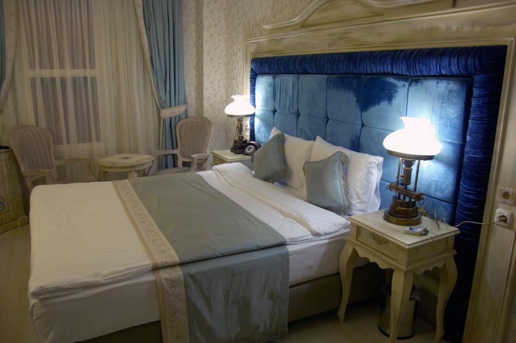 Trilyali Butik Hotel Tirilye Phòng bức ảnh