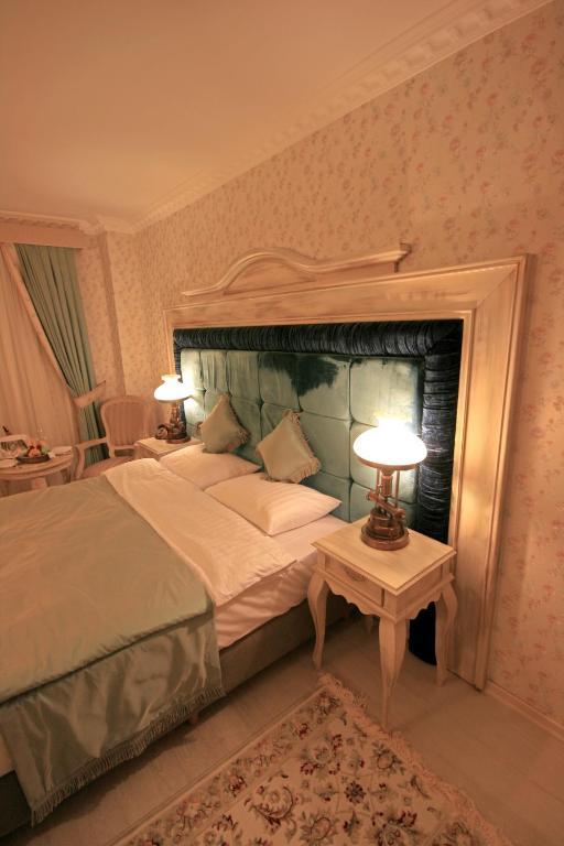 Trilyali Butik Hotel Tirilye Phòng bức ảnh